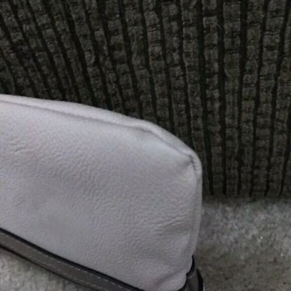 Simply Vera tan and cream wristlet